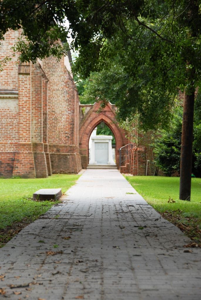 A brick walkway leading to Christ Episcopal church